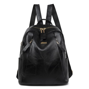 Vintage black PU leather backpack with leaf pattern texture and gold metallic zippers