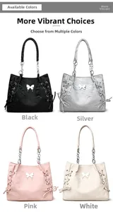 Detail of tote bags with metal butterfly charm and woven side ties in four colors