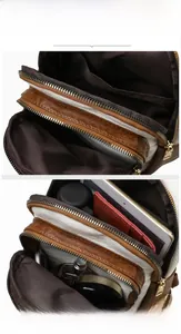 Internal display of multi-compartment crossbody bag showing capacity for daily essentials