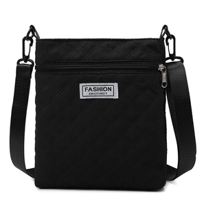 Sac bandoulière matelassé noir minimaliste avec motif losange et bandoulière réglable