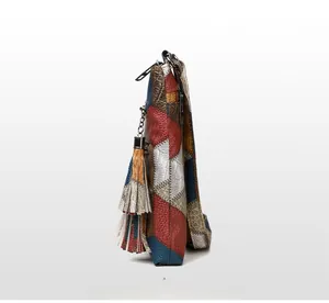 Macro shot of patchwork PU leather texture with detailed stitching and colorful tassel