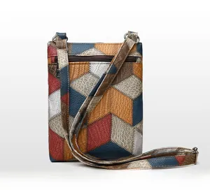 Detail of multi-pocket vintage PU leather crossbody bag featuring back zipper pocket