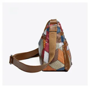 Side view of multi-color patchwork leather crossbody bag with woven strap and pebble texture