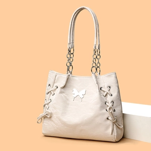 Elegant off-white PU tote bag featuring silver butterfly detail and chain strap