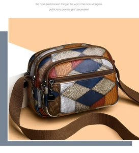 Detail view of multi-compartment zipper design on retro color-block square crossbody bag