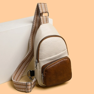 Retro multi-functional crossbody chest bag in cream white PU leather with brown pocket