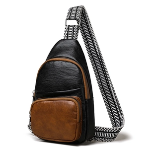 Vintage black and brown leather crossbody bag with geometric pattern wide woven strap