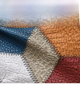 Macro shot of colorful diamond-patterned faux leather with a pebbled texture and stitching