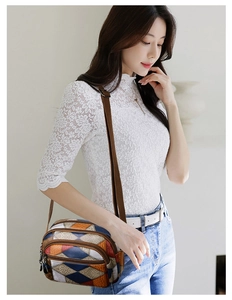 Detailed side view of a patchwork crossbody bag with multi-pocket design on model