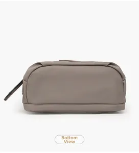 Detailed bottom view of the waterproof oxford cloth crossbody bag with uniform stitching