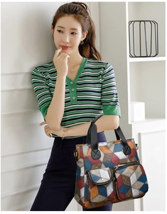 Detail of colorful geometric 3D pattern tote bag with double front utility pockets