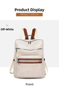 Front view of multi-pocket off-white faux leather backpack with brown trim and silver hardware