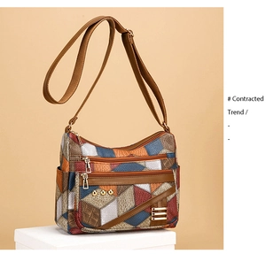 Vue détaillée du sac en cuir PU à patchwork géométrique et fermetures éclair dorées
