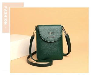 Detail of dark green lychee grain leather crossbody phone bag with kangaroo logo emblem