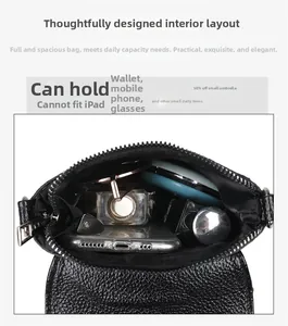 Top view of compact black leather bag showing interior storage for phone and makeup