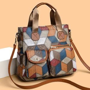 Vintage washed leather tote bag with geometric pattern and multiple front pockets