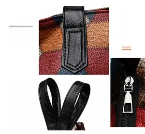 Dettaglio della borsa tote in pelle multicolore con texture a grana e zip in argento