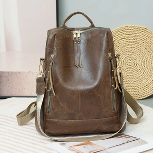Women's large PU leather backpack in dark brown with textured finish and adjustable strap