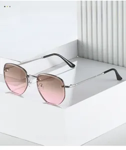 Close-up of polygon gradient sunglasses with silver metal frame on geometric background