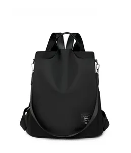 Front view of black waterproof oxford backpack with metal logo and anti-theft design