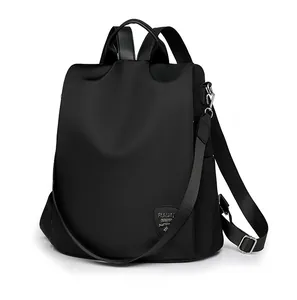 Side view of black water-resistant oxford backpack with premium metal zippers and leather trim
