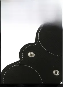 Detail of black leather glasses pouch featuring metal snap button and contrast stitching