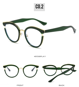 Detail view of cat-eye metal glasses frames with green TR90 finish and golden bridge