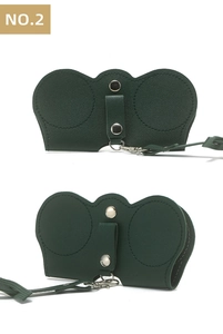 Detail of dark green leather sunglasses pouch with silver metal snap button and lanyard