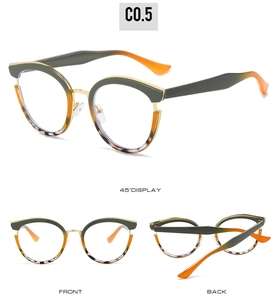 Detailed views of cat-eye frames with emerald green tops and gold metal accents