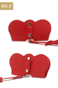 Detail of red lychee pattern PU leather sunglasses pouch with metal snap button and strap