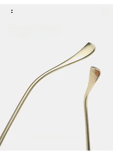 Detail view of curved golden metal temples for enhanced comfort on square sunglasses