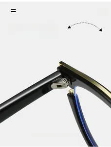 Close-up of durable metal hinges on stylish black cat-eye glasses frame with gold accents