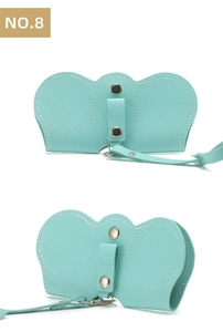 Detail of mint green PU leather sunglasses pouch with lychee texture and silver buttons