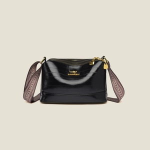 Black glossy crossbody bag with embossed stripes and colorful woven shoulder strap