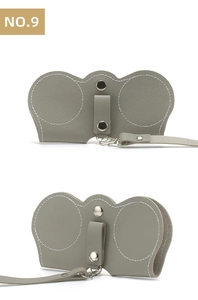 Close-up of grey PU leather sunglasses pouch with metal snap button and lanyard