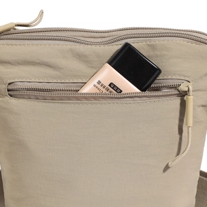 Fashionable beige nylon bucket bag with multiple zippers and spacious functional front pockets