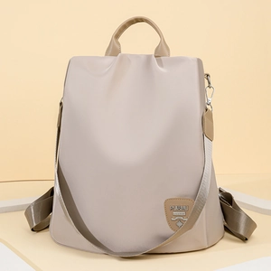 Waterproof light beige oxford cloth backpack for women with anti-theft design and leather handle