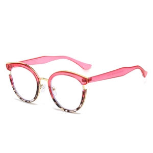 Chic cat-eye glasses with transparent red top, leopard print bottom, and gold metal bridge