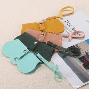 Portable lychee-grain PU leather eyeglass pouches in four colors with metal hooks