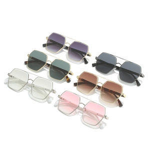 Set of six colorful vintage square metal sunglasses with double bridge frames on white background