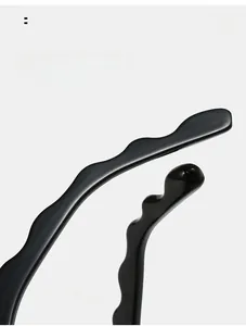 Detail of ergonomic wave-shaped glasses arms designed for a comfortable curved fit