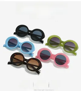 Collection of round frame sunglasses in black, blue, green, tortoiseshell, and pink
