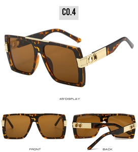 Close-up of tortoise frame square sunglasses with gold infinity metal details