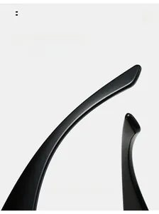 Detail of curved ergonomic black temples on Y2K oversized sunglasses for a comfortable fit