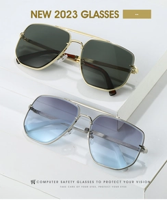 Detail einer eckigen Metall-Sonnenbrille mit Doppelsteg und farbigen Verlaufsgläsern