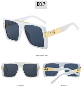 Detail view of square white sunglasses featuring golden metal accents and gray lenses