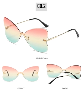 Three-view display of rimless butterfly sunglasses with gradient lenses and gold metal frames