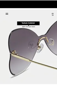 Detail of purple gradient frameless sunglasses with gold metal hinges and nose pads