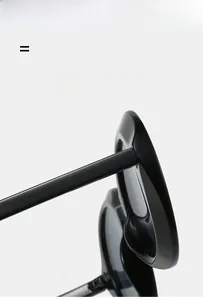 Detail show of wide-frame oval sunglasses with glossy finish and durable hinges