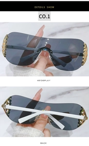 Detailed view of Y2K shield sunglasses with rhinestone hinges and white temples